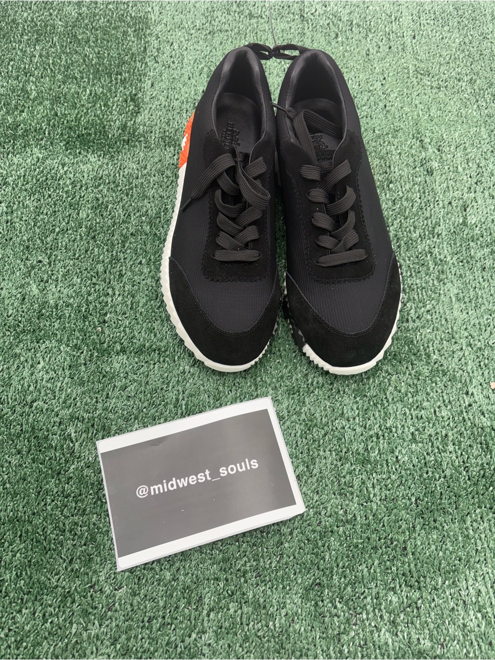 Hermes Black Low-Top Lace-Up Sneakers with Orange Heel Accent